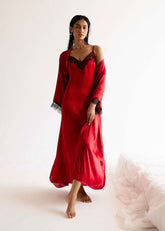 A woman wearing Midnight silk gown – dark blue women’s nightgown by LaRosa